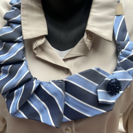 Handmade blue striped necktie necklace and ruffle collar created from upcycled tie.