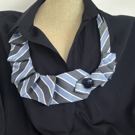 Handmade blue striped necktie necklace and ruffle collar created from upcycled tie.
