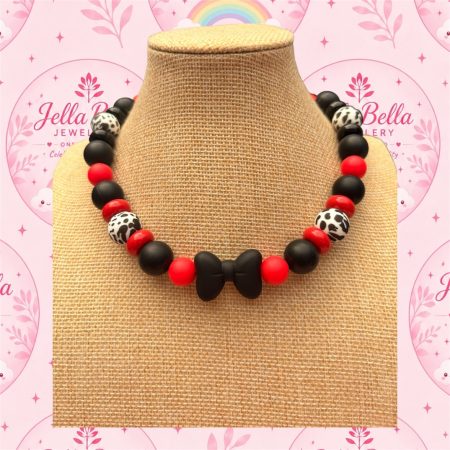 Bold beaded black,red and Dalmatian print bow centre necklace
