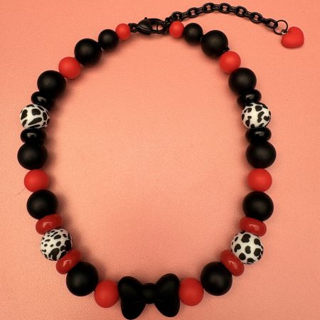 Bold beaded black,red and Dalmatian print bow centre necklace