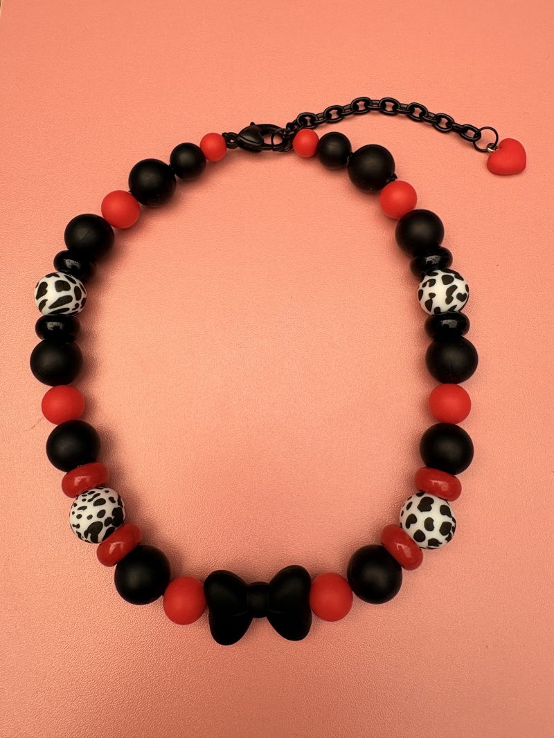 Bold beaded black,red and Dalmatian print bow centre necklace