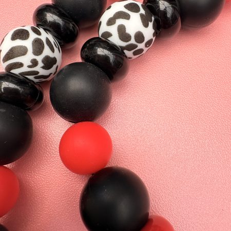 Bold beaded black,red and Dalmatian print bow centre necklace