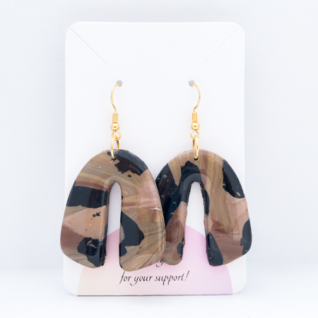 Arch shaped polymer clay earrings.