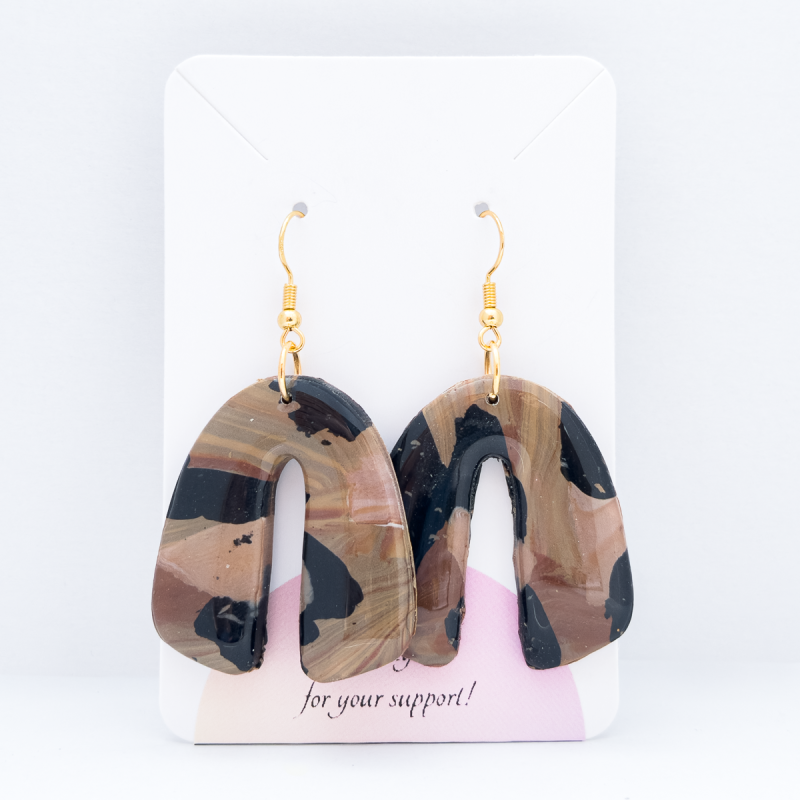 Arch shaped polymer clay earrings.