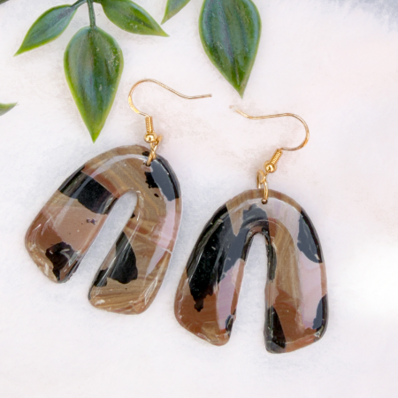 Arch shaped polymer clay earrings.