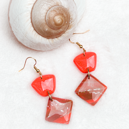 Handmade, 2 tier orange polymer clay earrings.