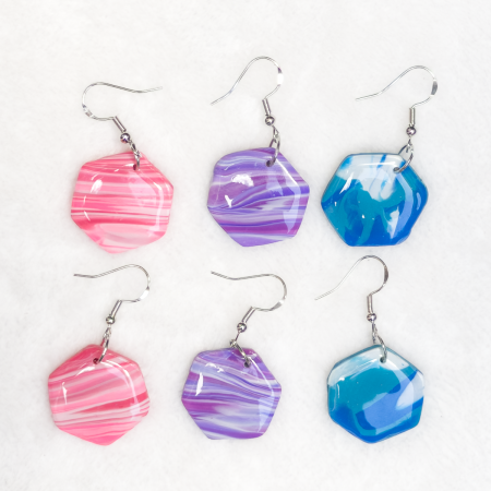 Small hexagon shaped, polymer clay earrings in various colours.