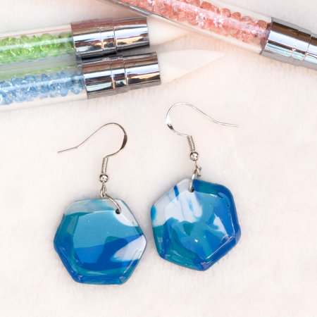 Small hexagon shaped, polymer clay earrings in various colours.