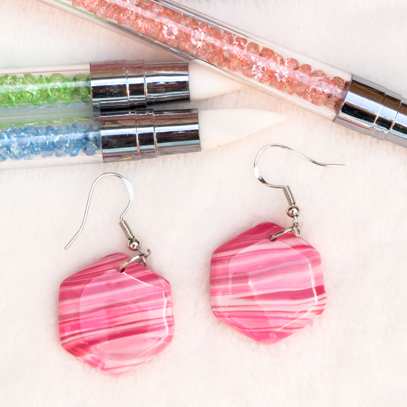 Small hexagon shaped, polymer clay earrings in various colours.