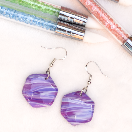 Small hexagon shaped, polymer clay earrings in various colours.