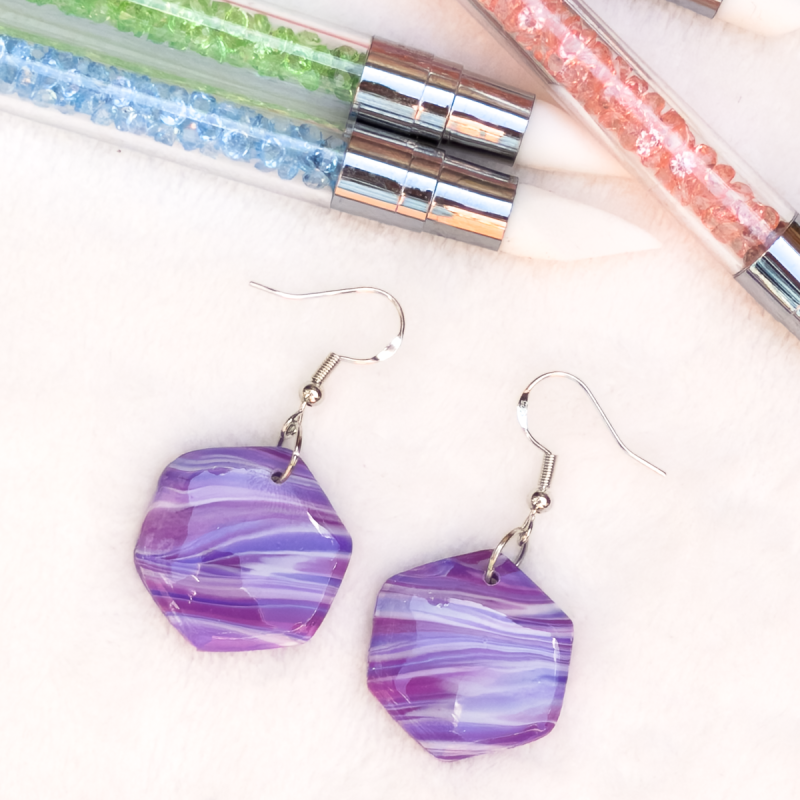 Small hexagon shaped, polymer clay earrings in various colours.