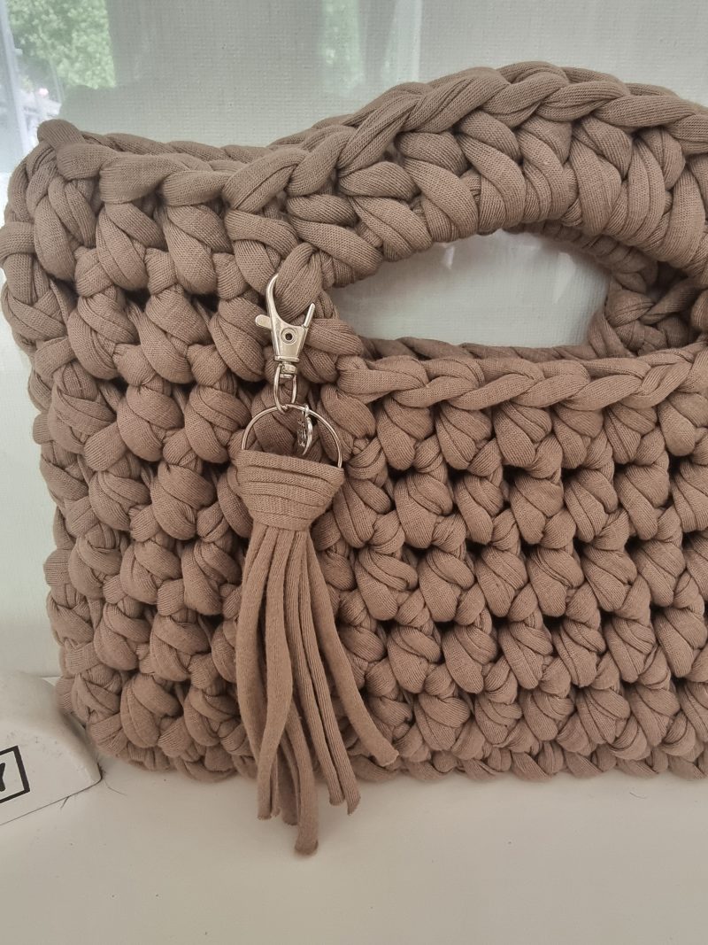 Crochet handbag in Stone with detachable tassle keyring