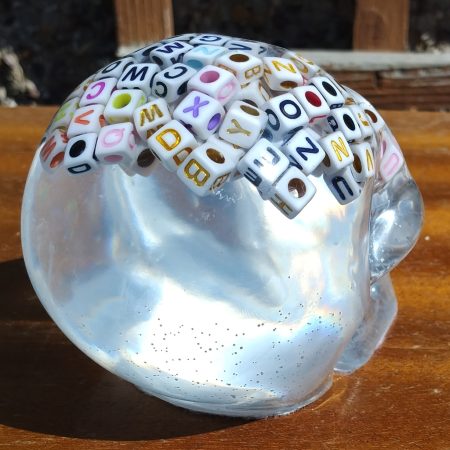 Large Resin Skull Clear with Alphabet Cubes