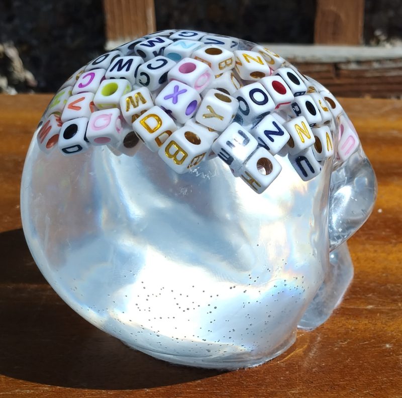 Large Resin Skull Clear with Alphabet Cubes