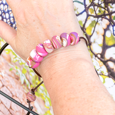 Beaded clay bracelet in various colours.
