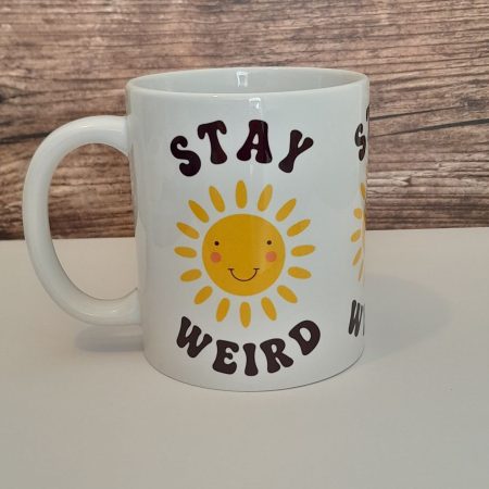 Stay Weird 12oz mug with smiling sun - brighten your day!