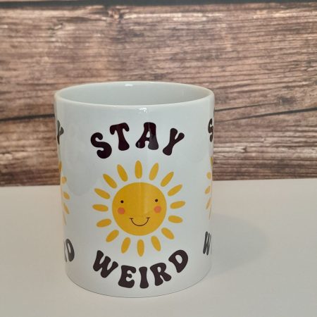 Stay Weird 12oz mug with smiling sun - brighten your day!