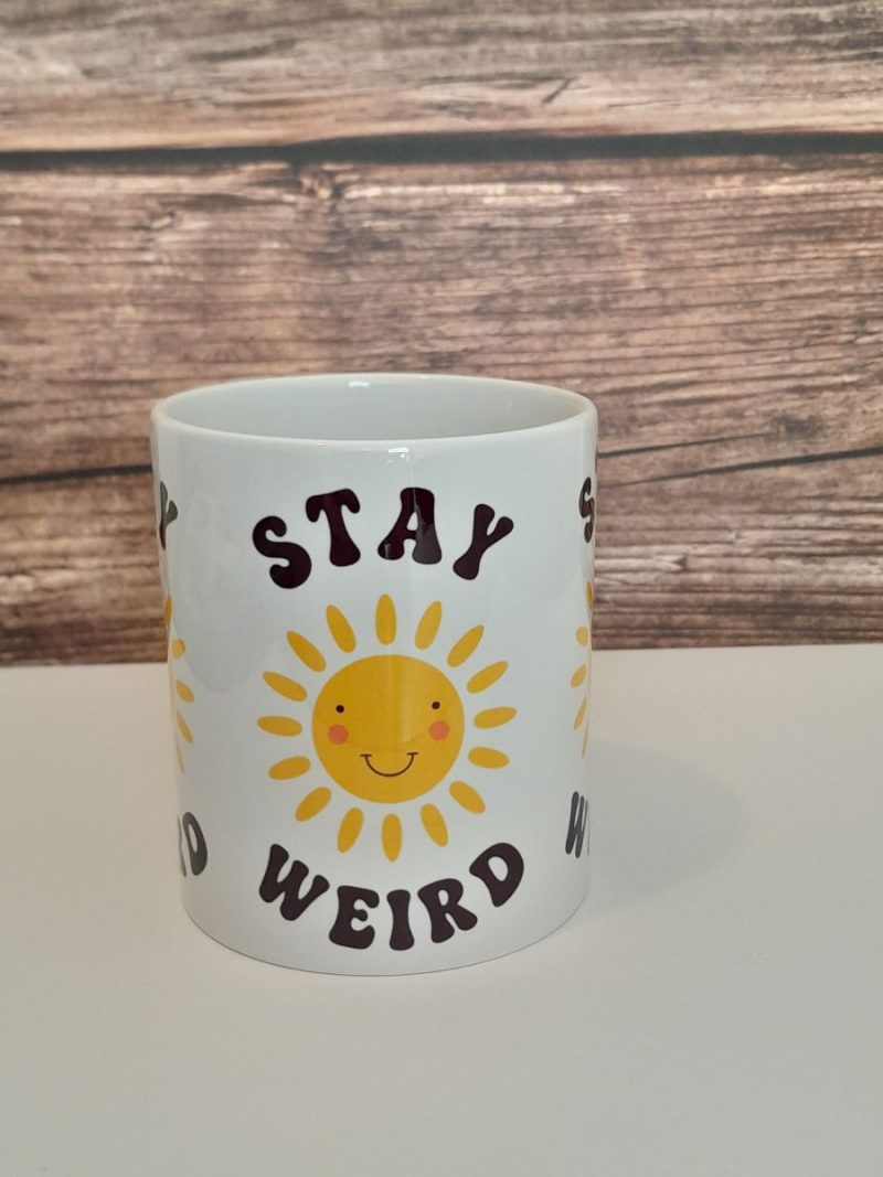 Stay Weird 12oz mug with smiling sun - brighten your day!