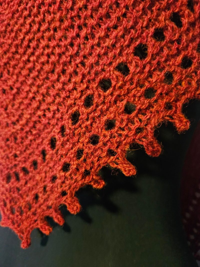 Handknitted 100% wool shawl.