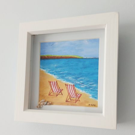 Framed Acrylic Painting of Filey Brigg with Deck Chairs and Shells