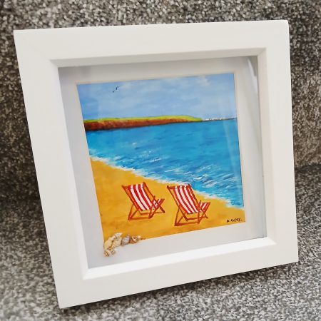 Framed Acrylic Painting of Filey Brigg with Deck Chairs and Shells