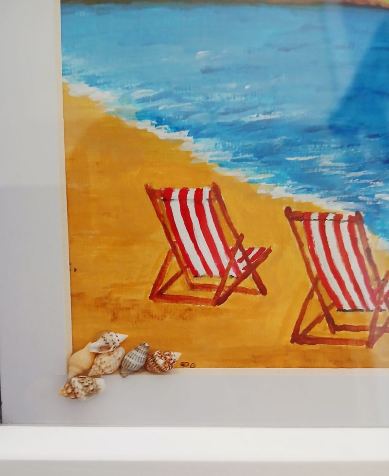 Framed Acrylic Painting of Filey Brigg with Deck Chairs and Shells