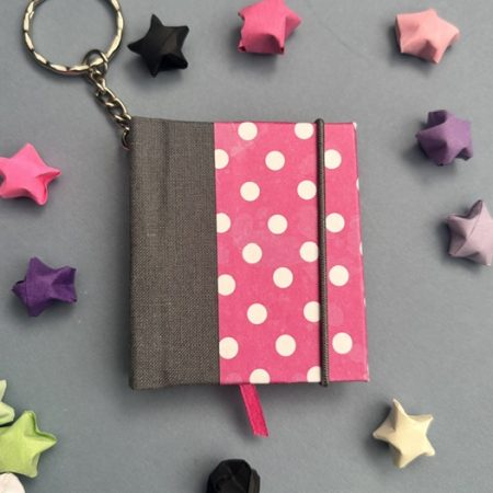 Handmade Notebook Keyring | 48 pages | Grey spine with pink cover and white polka dots | Ribbon page marker