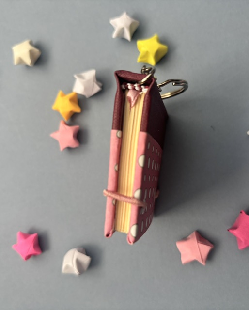 Handmade Notebook Keyring | 48 pages | Burgundy book cloth spine with pink cover with white dots | Unlined paper