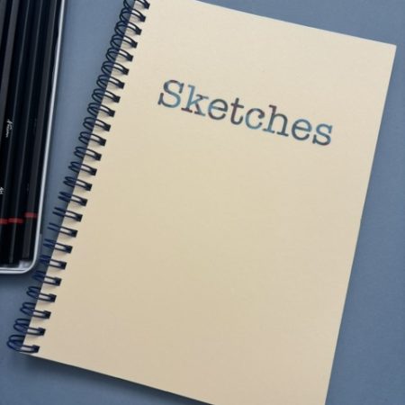 Wire bound plain unlined notebook | 70 pages | A5 | Softcover | Cream | Sketches design