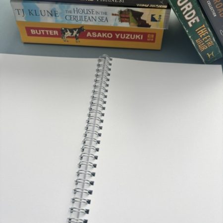 Wire bound plain unlined notebook | 70 pages | A5 | Softcover | Purple | Stack of books hand drawn design