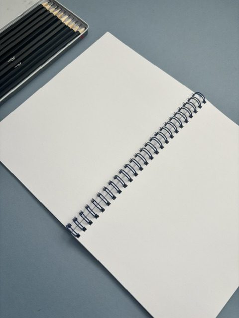 Wire bound plain unlined notebook | 70 pages | A5 | Softcover | Cream | Sketches design