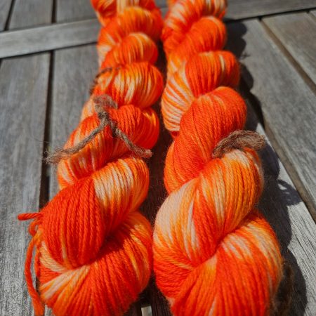 Hand dyed 100% wool yarn.