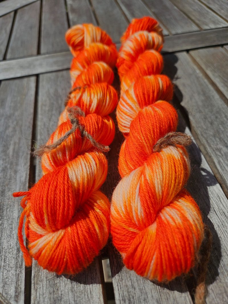 Hand dyed 100% wool yarn.