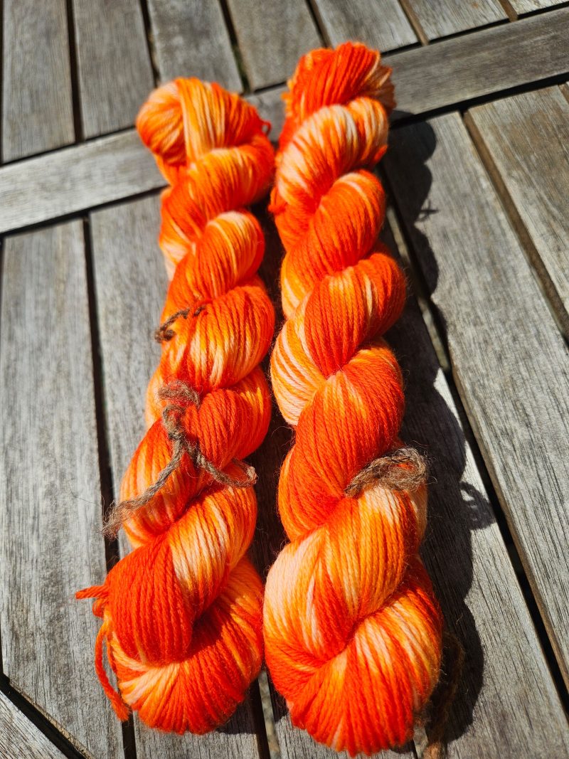 Hand dyed 100% wool yarn.