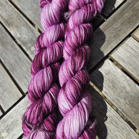 Hand dyed 100% wool yarn.