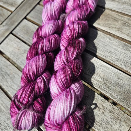 Hand dyed 100% wool yarn.