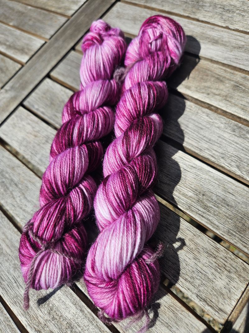 Hand dyed 100% wool yarn.