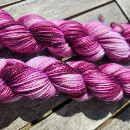 Hand dyed 100% wool yarn.