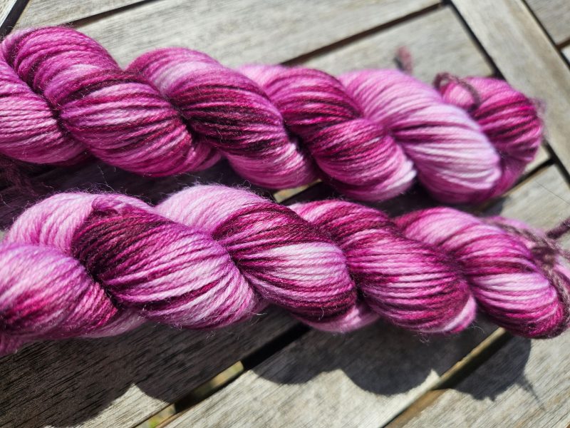 Hand dyed 100% wool yarn.