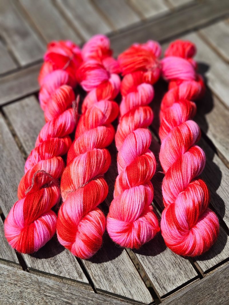 Hand dyed 100% wool yarn.