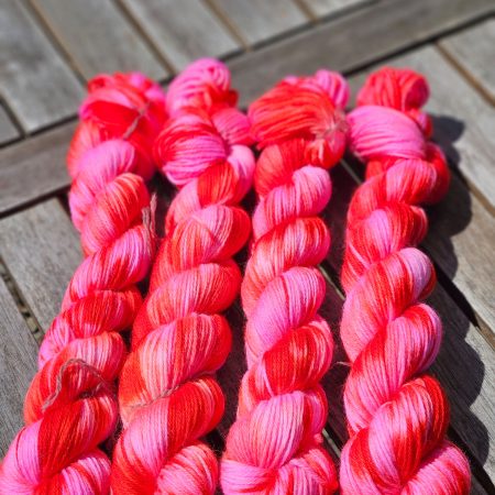 Hand dyed 100% wool yarn.
