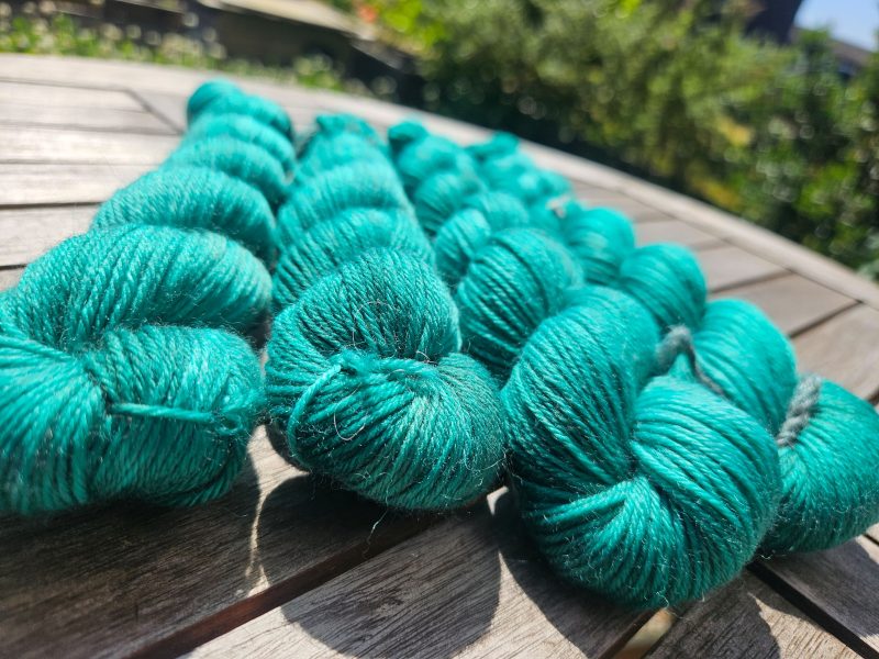 Hand dyed 100% wool yarn.