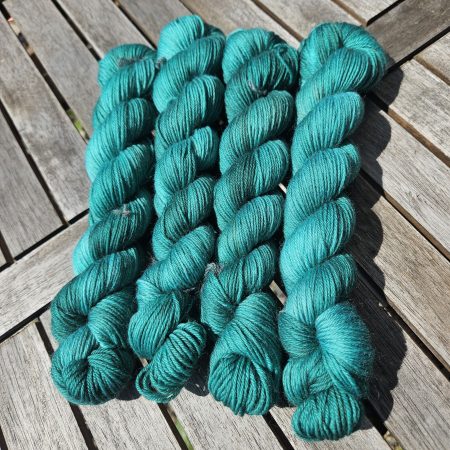 Hand dyed 100% wool yarn.