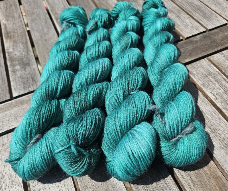 Hand dyed 100% wool yarn.