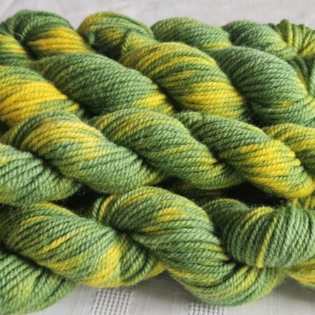 Hand dyed 100% wool yarn.