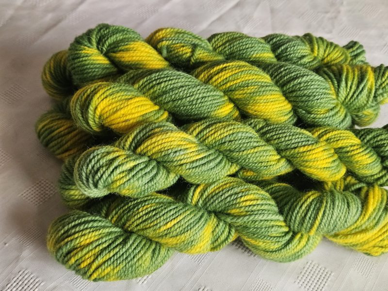 Hand dyed 100% wool yarn.