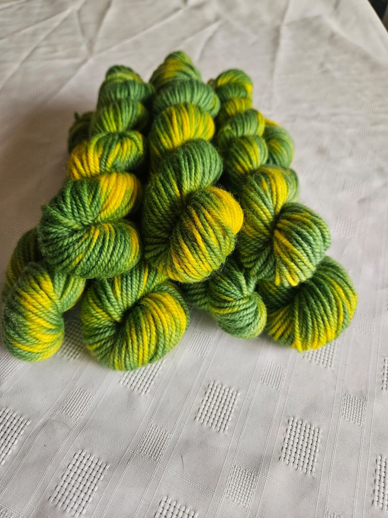 Hand dyed 100% wool yarn.