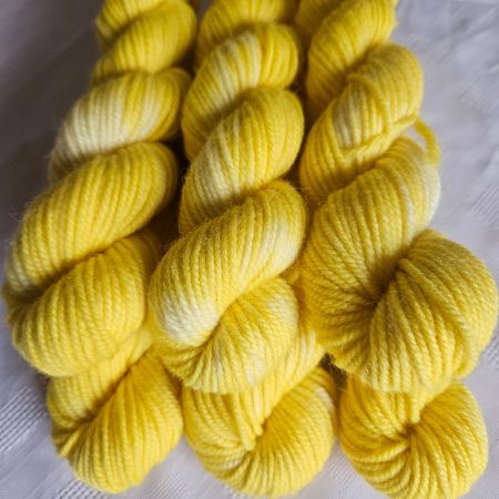 Hand dyed 100% wool yarn.