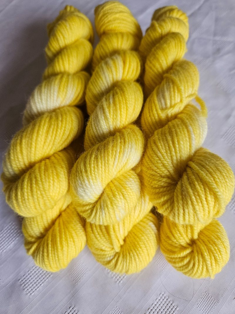 Hand dyed 100% wool yarn.