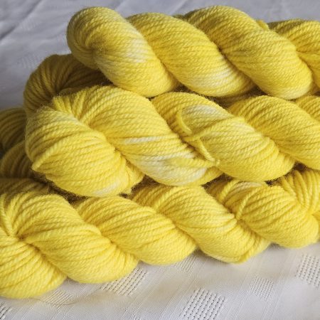 Hand dyed 100% wool yarn.